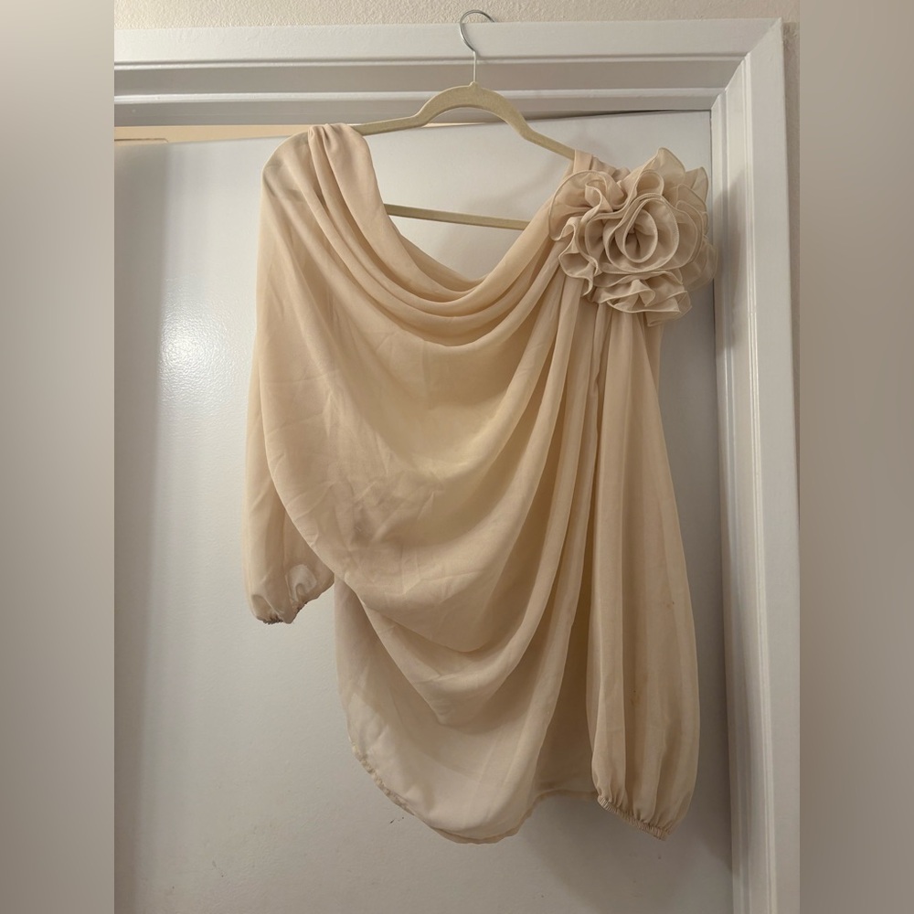 Elegant Cream Drape Top with Floral Accent